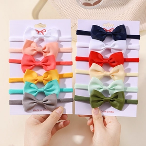 Set of 12 colorful baby nylon headbands with ribbed ribbon bows for infant girls