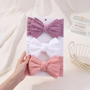 Détails de bandeaux élastiques pour bébé avec grands nœuds en rose, blanc et violet