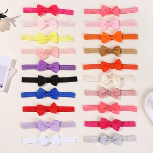 Lot de 20 bandeaux pour bébé avec nœuds colorés en ruban élastique brillant