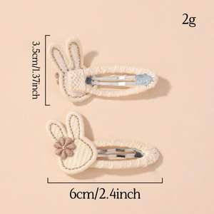 Cute beige rabbit hair clip set for girls featuring 3D embroidery and floral details