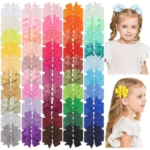 Set of 40 colors grosgrain ribbon hair bows for girls shown in a matrix and on a model
