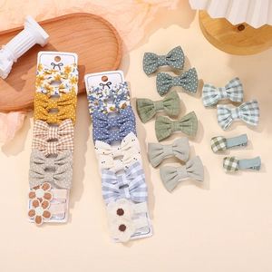 Floral plaid and polka dot fabric bow hair clips set for little girls in pastel colors