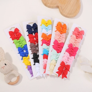 5-pack colorful grosgrain ribbon swallowtail bow hair clips for girls set on white cards