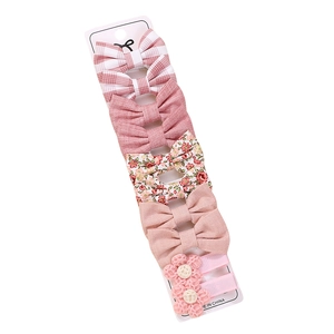 Set of 5 cute pink hair clips with plaid patterns and floral designs for little girls