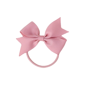 Pink grosgrain ribbon bow hair tie for girls with elastic band on white background