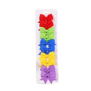 10-piece girls colorful grosgrain ribbon bow hair clips set on a white display card