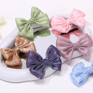 Set de seis lazos para el pelo en satén de colores pasteles con acabado brillante y liso