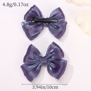 Juego de dos pinzas para el cabello con lazo morado brillante e iridiscente de 10 cm niñas
