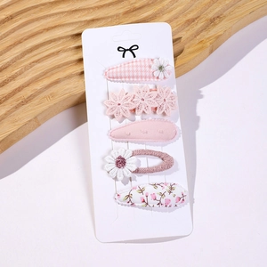 Detailed set of 5 pink baby hair clips with lace, flowers, and checkered patterns