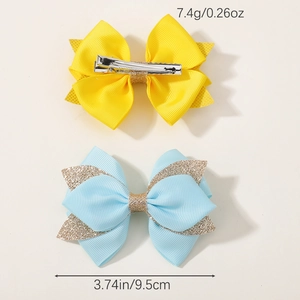 Handmade glitter bow hair clips set with duckbill clips in yellow and blue colors