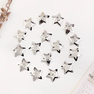 Set of 15 silver metal star hair clips arranged in a circle on a neutral background