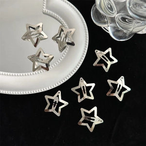 Set of 8 minimalist silver star hair clips with polished metallic hollow design