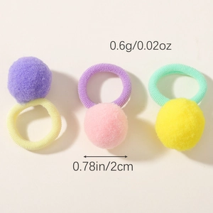 Three colorful plush ball elastic hair ties for girls in purple pink and yellow shades