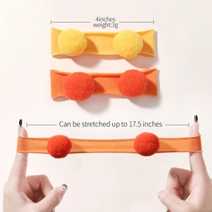 Bandeaux bébé en nylon avec pompons doux montrant une extension de 17,5 pouces