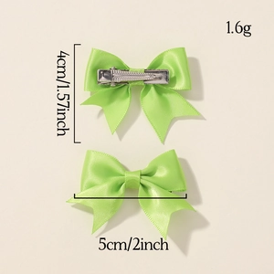 Mini satin bow hair clips for baby girls with metal alligator clips in bright green color