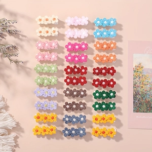 Pastel floral knitted hair clip set for kids with 27 pieces in various vibrant colors