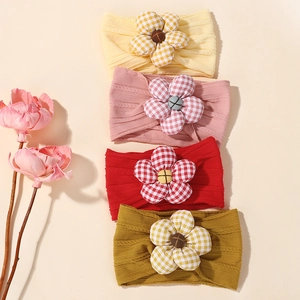 Set of four soft baby headbands with large gingham floral design in assorted warm colors