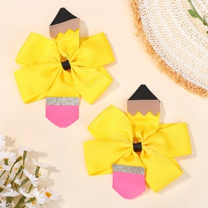 Détail de nœuds à cheveux en forme de crayon avec paillettes pour petites filles