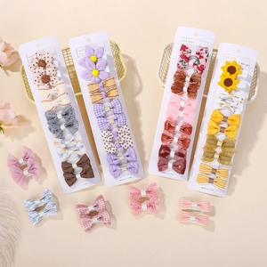 Charming girls' hair clip set with floral patterns and bows on display cards