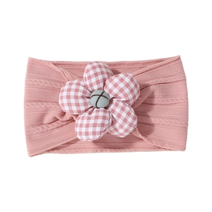 Pink knitted baby headband featuring a soft gingham fabric flower and wavy texture