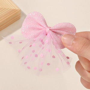 Detail of pink sequin bow hair clip with dotted mesh veil for girls hair accessories