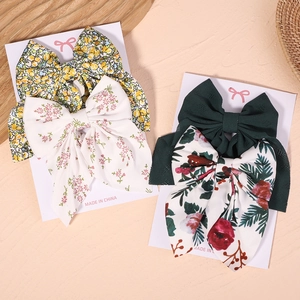 Lot de quatre barrettes à nœuds en tissu avec motifs floraux vintage et couleurs unies