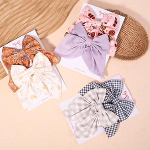 Lot de six barrettes à nœuds colorés avec motifs floraux et à carreaux pour enfants