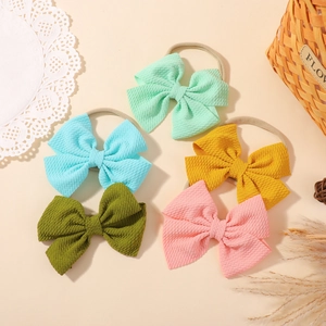 Five-piece textured fabric bow headband set in soft pastel colors for girls