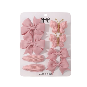 Set of 8 pink hair clips including ribbon bows and lace butterflies for girls