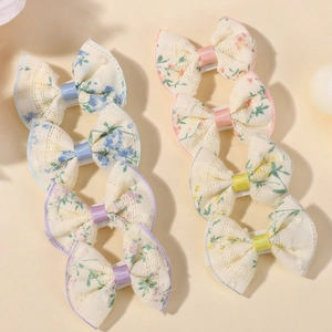 8-piece set of floral lace bow hair clips for kids in blue, pink, purple, and yellow