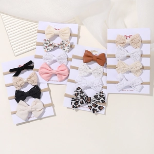 Set of 16 baby bow headbands featuring nylon bands and floral or leopard print styles
