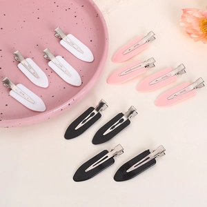 Set of 12 matte candy color seamless hair clips in white, pink, and black colors