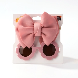 Ensemble bandeau à nœud rose et lunettes de soleil fleurs pour bébé fille en vacances