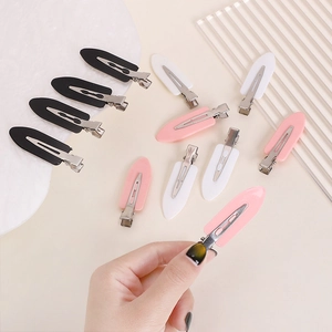 Minimalist candy colored seamless hair clips in black, white and pink colors