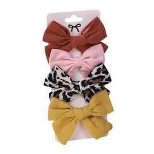 Lot de 4 barrettes nœuds en lin pour enfants aux motifs léopard, rose, jaune et rouge