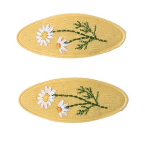 Paire de barrettes ovales en tissu jaune avec marguerites brodées pour filles