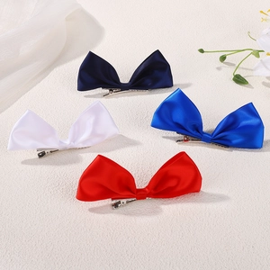 Set of four colorful satin bow hair clips in red white and blue for girls daily styling