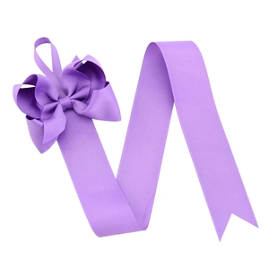 Lavender purple hair accessory organizer strap with layered bow and ribbed texture