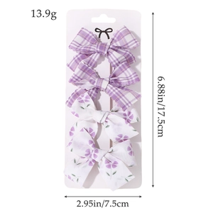 Set of four purple bow hair clips for girls featuring plaid and floral fabric patterns
