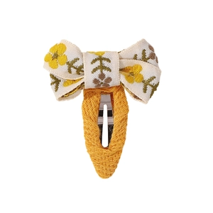 Floral embroidered cream bow hair clip with yellow knitted base for girls