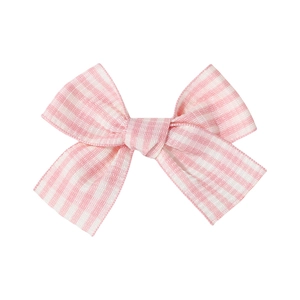 Pink and white plaid bow hair clip set for girls made of soft fabric texture