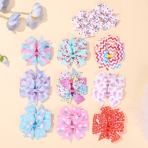 Détail de l'ensemble de 10 barrettes à nœuds imprimés colorés pour filles