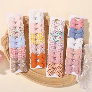 Set da 20 pezzi di simpatiche mollette per capelli bimbi con motivi floreali