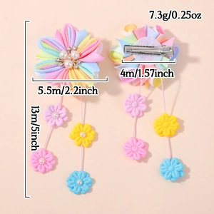 Barrette enfant fleur en ruban arc-en-ciel avec perles, strass et longs glands colorés