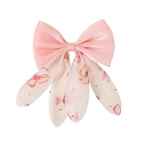 Barrette à cheveux rose satinée avec pompons en mousseline florale et strass scintillants