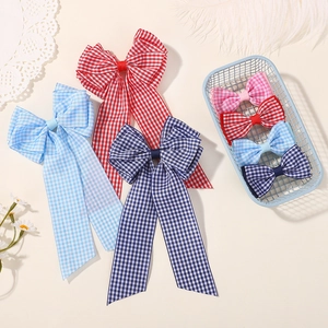 Set di fiocchi per capelli a quadretti con nastri lunghi e piccole clip colorate