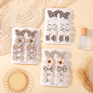 Cute children's hair clip set with lace butterflies and polka dot bows for girls