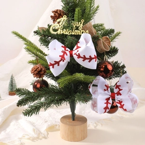 Close-up of white ribbed bow hair clips with red baseball stitching and sequins