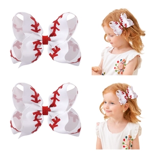 Baseball bow hair clip for girls featuring white ribbed ribbon and red glitter stitching