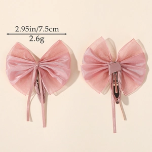 Paire de barrettes à cheveux en maille organza rose avec nœuds pour enfants